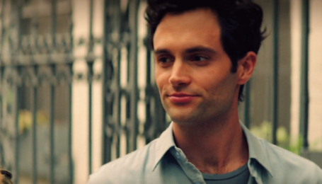 penn in a greyish shirt 